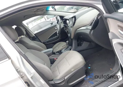 2016 Hyundai Santa Fe Sport 2.4L z USA, uszkodzony, nr VIN 5XYZTDLB3GG329573